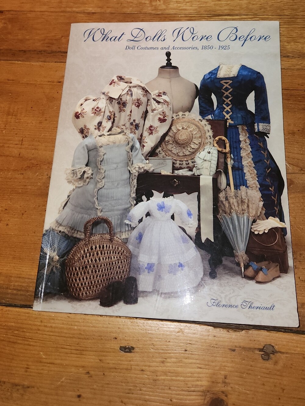 What Dolls Wore Before Hardcover Book  Blue & Cream Cover Soft Cover Illustrated